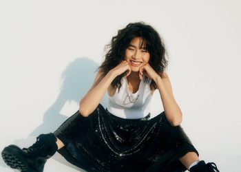 Image may contain Clothing Apparel Human Person Footwear Shoe and Sleeve