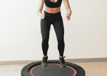 woman jumping on mini-trampoline