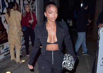 Lori Harvey Hits Craig’s Restaurant in Bottega Veneta Black Jacket, Pants, and Black and White Zebra Bag