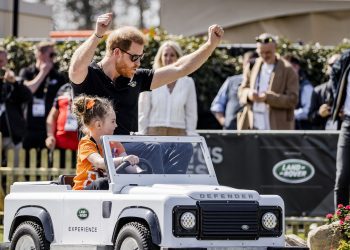 Prince Harry Rides Shotgun in Comically Small Vehicle, Faces Obstacles