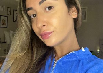 Image may contain Face Human Person Clothing Apparel and Smile