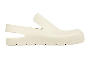 Image may contain: Leisure Activities, Clothing, Apparel, and Musical Instrument