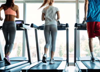 3 people running on treadmills