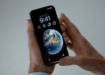 Hands holding iPhone