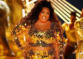 LOS ANGELES, CALIFORNIA - JUNE 26: Lizzo performs onstage during the 2022 BET Awards at Microsoft Theater on June 26, 2022 in Los Angeles, California. (Photo by Leon Bennett/Getty Images for BET)