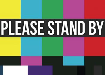 image of an error screen used in television transmission, showing vertical bars in various colors with the words please stand by superimposed with white letters in a black box