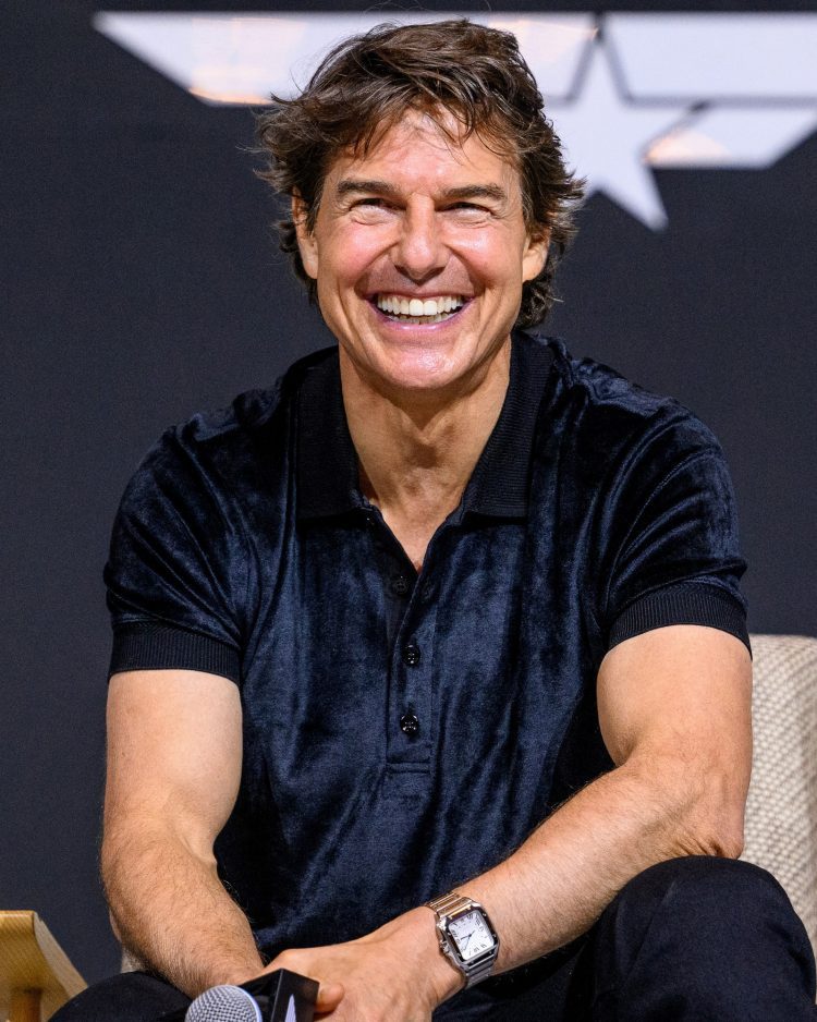 Tom Cruise smiles during a press conference for the film 'Top Gun Maverick' in Seoul
