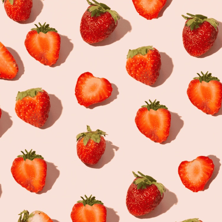 graphic photo of flat lay strawberries on pink background