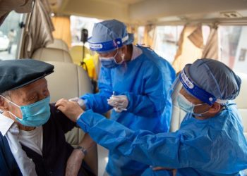 Beijing Rolls Out China’s First Ever COVID Vaccine Mandate