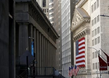 NEW YORK, NEW YORK - JULY 03: American Flags hang from the NYSE during Independence Day weekend on July 03, 2022 in New York City. (Photo by John Lamparski/Getty Images)