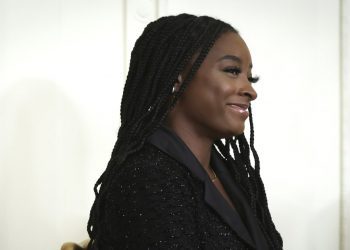 Simone Biles Wears a Summery Head-to-Toe Orange Outfit