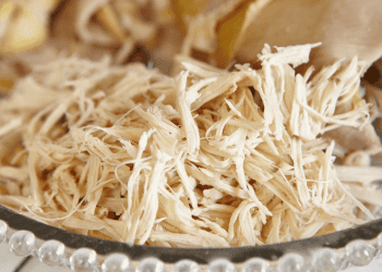 clear bowl of shredded chicken