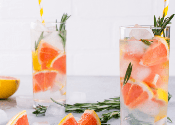 cups filled with herbs and fruit
