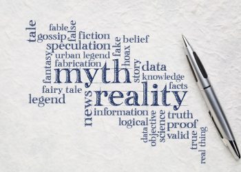 A word cloud illustrating "myth" and "reality" in blue words against white background with silver pen; contrasting phrases include "urban legend," "data, "fake," and "proof"