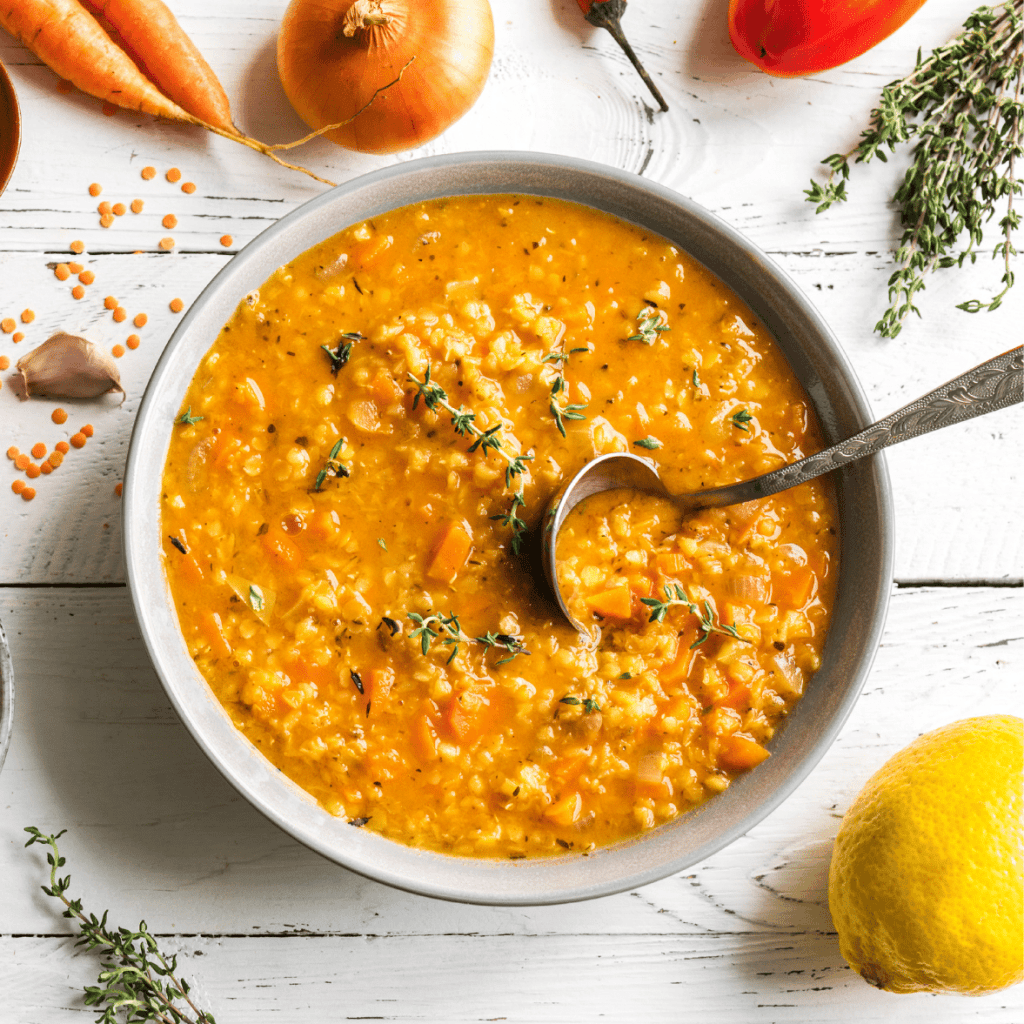 bowl of fall soup on white table