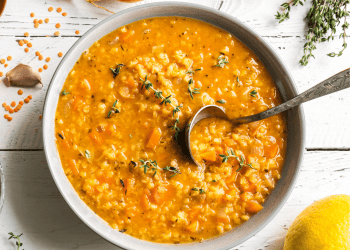 bowl of fall soup on white table