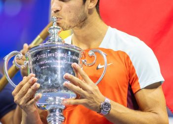 Carlos Alcaraz of Spain with the winner's trophy after his victory against Casper Ruud of Norway in the Men's Singles...