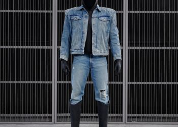 Image may contain Clothing Apparel Pants Denim Jeans Human Person Footwear Boot and Riding Boot