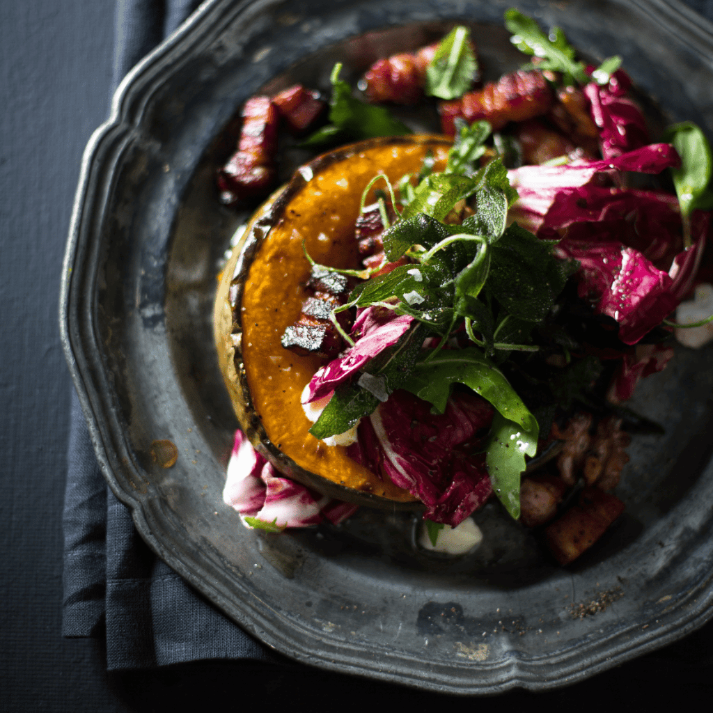 black plate with salad