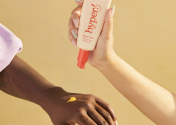 hyper skin mask on two hands being applied
