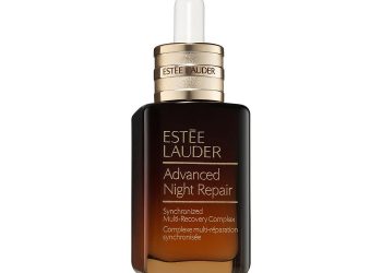 Brown dropper bottle of Estée Lauder Advanced Night Repair Synchronized Multi-Recovery Complex on white background