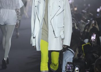 Image may contain Clothing Apparel Coat Human and Person