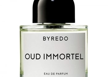 A glass perfume bottle filled with the Byredo Oud Immortel Eau de Parfum on a white background