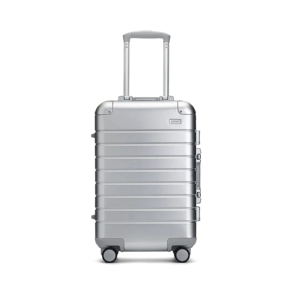 Away The Bigger Carry-On: Aluminum Edition silver suitcase on white background